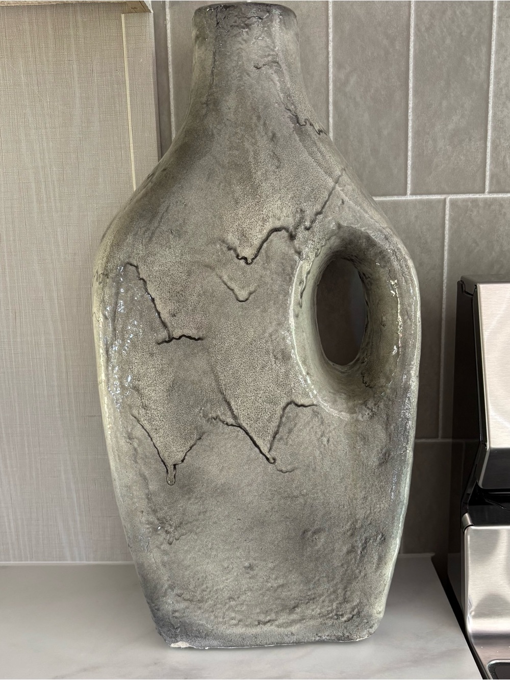 18 Inch Tall Contemporary Gray Ceramic Accent Vase with Sculptural Cutout